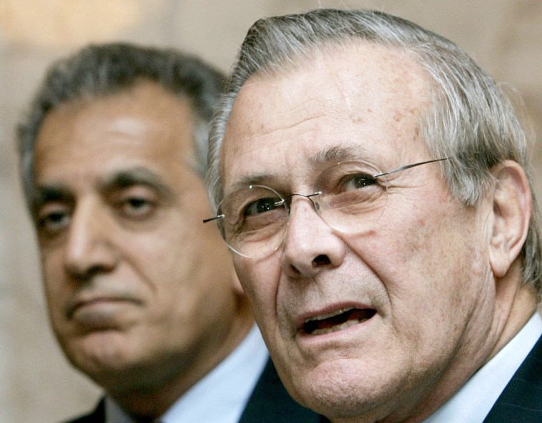 Secretary of Defense Donald Rumsfeld, right, speaks at a news conference with U.S. Ambassador to Iraq Zalmay Khalilzad in Baghdad on Thursday.